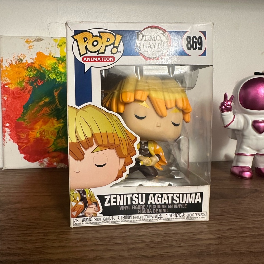 Funko Pop Animation Figure with Yellow and Orange Accents